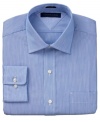 A spread collar and slim fit tailoring add to the sleek appeal of this dress shirt from Tommy Hilfiger.