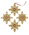 Let it show. Gold snowflake ornaments gleam from any branch thanks to a brilliant glitter finish and sparkling white center. With two distinct designs.