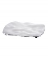 Pretty and polished, this Organics trivet from Lenox combines a natural shape in bright aluminum with a playful ruffled edge. Qualifies for Rebate