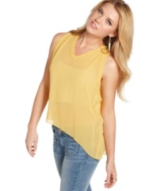 Sheer and asymmetrical, this top from GUESS? strikes a chic cord by combining two of the season's most trend-right details! Sheer and asymmetrical, this top from GUESS? strikes a chic cord by combining two of the season's most trend-right details!