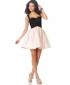 Fun, fresh and flirty: JS Collection combines a sexy fitted bodice with a flared skirt for a fashion-forward look.