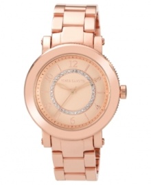 Pave accents swim and shimmer along a rosy timepiece from Vince Camuto.