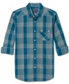 Asymmetric chest pockets add a twenty-first century spin to this long-sleeved shirt in retro plaid from American Rag.