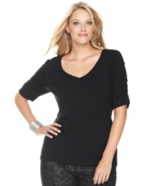 INC's plus size basic tee comes in a flattering jersey fabric with ruffled sleeves for extra oompth!