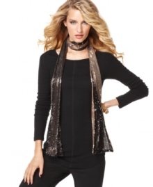 Add a little glam-rock attitude to your outfit with INC's double-sided sequined scarf!