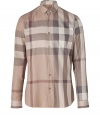 Work an iconic edge into your contemporary separates with Burberry Londons sharp cotton check shirt, finished with a French placket for a flawless look - Small cutaway collar, long sleeves, buttoned cuffs, button-down front - Modern slim cut - Wear with everything from pullovers and jeans to slim tailored suits