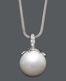Highlight your neckline with a polished pearl and a hint of sparkle. A single cultured South Sea pearl (14 mm) hangs from a delicate 14k white gold chain and bail accented with sparkling diamonds. Approximate length: 18 inches. Approximate drop: 1 inch. Highlight your neckline with a polished pearl and a hint of sparkle. A single cultured South Sea pearl (14 mm) hangs from a delicate 14k white gold chain and bail accented with sparkling diamonds. Approximate length: 18 inches. Approximate drop: 1 inch.
