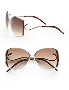 This sleek design boasts a ridged metal frame with hook detailed temples for a truely unique look. Available in shiny rose gold/havana with brown gradient lens. Hook detailed temples100% UV protectionMade in Italy This sleek design boasts a ridged metal frame with hook detailed temples for a truely unique look. Available in shiny rose gold/havana with brown gradient lens. Hook detailed temples100% UV protectionMade in Italy