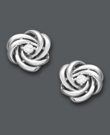 The knot is a symbol of ultimate commitment and love. This diminutive, yet dazzling, style by Wrapped in Love features a round-cut diamond (1/10 ct. t.w.) cradled in swirls of 14k white gold. Approximate diameter: 4/10 inch. The knot is a symbol of ultimate commitment and love. This diminutive, yet dazzling, style by Wrapped in Love features a round-cut diamond (1/10 ct. t.w.) cradled in swirls of 14k white gold. Approximate diameter: 4/10 inch.