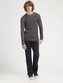 Soft, cozy texture woven from space-dyed cotton with a slim fit and button detail. Crewneck Cotton; hand wash Imported