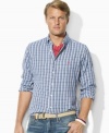 Rendered in soft, lightweight cotton twill, a classic-fitting shirt channels rugged appeal in a handsome plaid pattern.