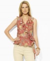 Designed in a flattering wrap silhouette from airy cotton voile, Lauren Jeans Co.'s sleeveless blouse exudes vintage charm with a timeworn floral print and soft ruffles.