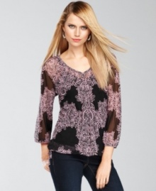 INC updates a soft peasant top silhouette with bold color and a paisley print for an appealing anytime casual look. INC updates a soft peasant top silhouette with bold color and a paisley print for an appealing anytime casual look.
