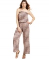 Take a walk on the wild side with Sunny Leigh's animal-print jumpsuit. A softly draped strapless silhouette and flowing wide legs define it as a trendy choice for your next night out.