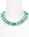 Take your jewel box on vacation with Lauren by Ralph Lauren's chunky beaded collar. With a resort-vibe this turquoise strand adds low-key chic to your beachy best.