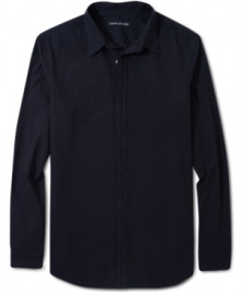 With thin stripes and a flattering fit, this DKNY button down is sure to become your new go-to shirt. With thin stripes and a flattering fit, this DKNY button down is sure to become your new go-to shirt.
