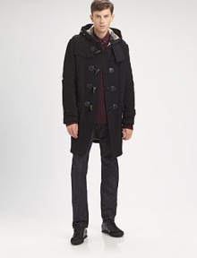 This toggle coat offers Burberry Brit's stylish take on a classic style.Attached hoodToggle closureGunflaps and rainflapPatch pocketsBack yokeAbout 37 from shoulder to hem80% wool/20% polyamideDry cleanImportedThis style runs true to size. We recommend ordering your usual size for a standard fit. 