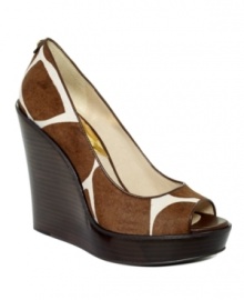 Put some giraffe-print into your tailored footwear with MICHAEL by Michael Kors' Dalia platform wedges.