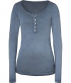 Work an effortless edge into your casual staples with True Religions faded midnight heather henley, detailed in a super soft mix of lightweight cotton-modal - Scoop neckline, long sleeves, logo patch and printing on front and back at hemline - Slim fit - Wear with casual separates and shearling-lined boots