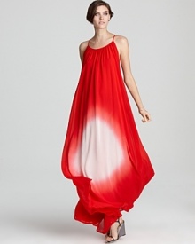Flaunting a red and white ombre color treatment, this silk French Connection maxi dress makes an allusion to the fiery sun for fashion-forward, day-to-night style. Flaunting a red and white ombre color treatment, this silk French Connection maxi dress makes an allusion to the fiery sun for fashion-forward, day-to-night style.