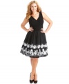 A tulle lining gives this gorgeous plus size dress by SL Fashions its fabulous A-line silhouette. The floral-inspired applique makes it perfect for spring occasions!