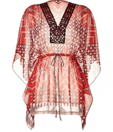 Bring 1970s-inspired style to your day or night look with this vibrant tunic - Banded V-neck with contrasting print detail, all-over geometric print, flutter sleeves, drawstring waist, draped side detail - Pair with flared jeans, a retro-styled leather jacket and platforms Bring 1970s-inspired style to your day or night look with this vibrant tunic - Banded V-neck with contrasting print detail, all-over geometric print, flutter sleeves, drawstring waist, draped side detail - Pair with flared jeans, a retro-styled leather jacket and platforms