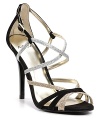 Lush velvet and glittering silver straps perch upon delicate heels for an undeniably elegant evening look. By Aqua.