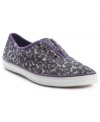 Proof that animal print goes everywhere! Zebra and leopard prints look fiercely in fashion on these easy, slip-on sneakers from Keds by American Rag.