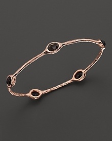 From the Rosé collection, five smoky quartz stations on a hammered bangle. Designed by Ippolita. From the Rosé collection, five smoky quartz stations on a hammered bangle. Designed by Ippolita.
