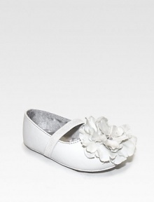 Fluttery fabric flowers with sparkly rhinestones adorn shiny slip-ons with easy stretch straps.Patent-look upper Elasticized stretch strap Skid-resistant rubber sole Man-made Imported Fluttery fabric flowers with sparkly rhinestones adorn shiny slip-ons with easy stretch straps.Patent-look upper Elasticized stretch strap Skid-resistant rubber sole Man-made Imported