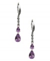 Polish your look with not one, but two, vibrant pops of color! Judith Jack's stunning drop earrings feature two pear-cut amethyst drops (3-5/8 ct. t.w.) and glittering marcasite (1/5 ct. t.w.). Set in sterling silver. Approximate drop: 1-3/4 inches.