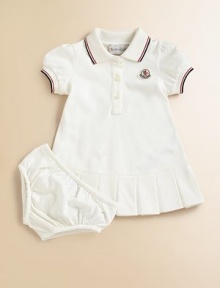 Soft, airy pique knit with sporty stripes, perfect for your future tennis star.Ribbed polo collar with two-color striped tippingShort sleeves with ribbed, tipped cuffsButton placketLogo appliqué at chestBox pleated hemMatching bloomer with elasticized waist and leg openings96% cotton/4% elastaneMachine washImported Please note: Number of buttons may vary depending on size ordered. Soft, airy pique knit with sporty stripes, perfect for your future tennis star.Ribbed polo collar with two-color striped tippingShort sleeves with ribbed, tipped cuffsButton placketLogo appliqué at chestBox pleated hemMatching bloomer with elasticized waist and leg openings96% cotton/4% elastaneMachine washImported Please note: Number of buttons may vary depending on size ordered.