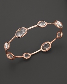 Rose gold, set with clear, faceted quartz stations, is elegant alone--and striking when stacked. By Ippolita. Rose gold, set with clear, faceted quartz stations, is elegant alone--and striking when stacked. By Ippolita.