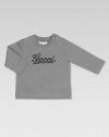 Crafted in plush cotton jersey with cursive Gucci print and shoulder buttons.CrewneckLong sleevesShoulder buttonsCottonDry cleanMade in Italy Please note: Number of buttons may vary depending on size ordered. 