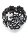 Fashion that goes off like a big bang. This stretch bracelet lends a gorgeous touch to your outfits with plastic stone accents in a starburst design. Stretches to fit wrist. Crafted in hematite tone mixed metal. Approximate diameter: 2-1/2 inches.