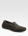 Sporty suede moc driver with stitch detail and an embossed logo.Suede upperRubber soleImported