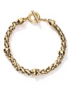 Lauren by Ralph Lauren's shining woven chain bracelet is sure to a beloved go-to accent.