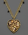 Fall in love with this very cool look from Betsey Johnson. Resin-coated heart-shaped leopard pendant dangles on a layered goldtone metal chain with cute geometric charms throughout. Chain measures 26 inches; drop measures 1-1/2 inches.