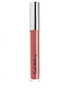 Trish's innovative lip-enhancing formula is lightly flecked with alluring points of light and delivers a radiant finish. Trish's innovative lip-enhancing formula is lightly flecked with alluring points of light and delivers a radiant finish.