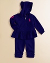 An iconic big pony embellishment is front and center along this adorable matching fleece hoodie and sweatpants set. Hoodie Attached hoodLong sleeves with ribbed cuffsZip-front closureKangaroo pocketRuffle hem Sweatpants Elastic waistband with bow tie detailSide ruching along ankles55% cotton/40% polyester/5% elastaneTrim: cottonMachine washImported