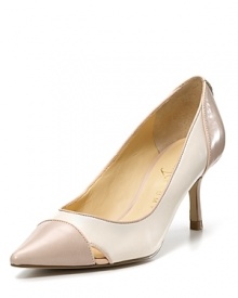 Contrast-colored trim lends playful appeal to the Ivee cutout pumps from IVANKA TRUMP.