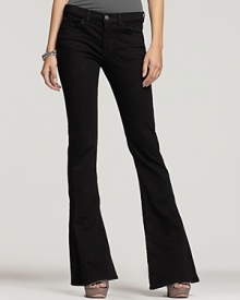 Bring back a vintage silhouette with elegance in these uniform wash J Brand jeans. Bring back a vintage silhouette with elegance in these uniform wash J Brand jeans.