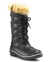 A bold, cozy burst of faux fur and chic, quilted canvas make winter's blasts a little less daunting. By Sorel.