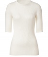 Stylish pullover in fine, cream rayon, nylon and cashmere blend - Soft, lightweight knit features elegant, all-over ribbing - On-trend, elbow-length sleeves and classic crew neck - Fitted silhouette is long and lean, tapers at waist - Polished and versatile, seamlessly transitions from work to weekend - Pair with suit trousers, pencil skirts, skinny denim or slim chinos