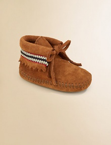 Adorned with traditional American braid detailing, fringe cut-out and front tie closure, these cozy little booties are boho chic for baby.Tie closureSuede upperRubber solePadded insoleImported Adorned with traditional American braid detailing, fringe cut-out and front tie closure, these cozy little booties are boho chic for baby.Tie closureSuede upperRubber solePadded insoleImported