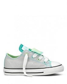 Double tongue Converse sneakers. A colorful canvas classic that transcends the ages. Double tongue Converse sneakers. A colorful canvas classic that transcends the ages.