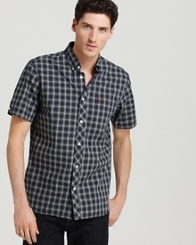 Subtle details like the offset placket and a split back yoke offer unique designer flair on this short-sleeve button-down you'll reach for again and again. Subtle details like the offset placket and a split back yoke offer unique designer flair on this short-sleeve button-down you'll reach for again and again.