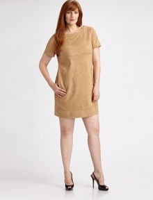 Delicate suede boatneck with zippered front pockets and an exposed back zipper. Boatneck Short sleeves Zippered front pockets Exposed back zipper About 22 from natural waist Silk piping 94% polyester/6% spandex Dry clean Imported