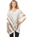 Calvin Klein's got a poncho with punch! Metallic open-knit chevron stripes give this piece an airy, ethereal feel.