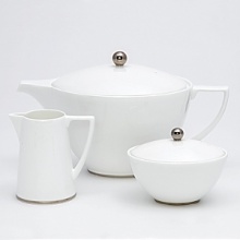 Jasper Conran continues to close the gap between formal dining and casual living. He accents the contemporary beauty of his already popular white bone china range with a touch of formality in the forum of a thin platinum band. To create an interplay of proportions, accent pieces including a plate, a charger, a small pitcher, mug, teacup and saucer, use thick platinum stripes to reinforce the pattern's look of sophisticated elegance. Jasper Conran continues to close the gap between formal dining and casual living. He accents the contemporary beauty of his already popular white bone china range with a touch of formality in the forum of a thin platinum band. To create an interplay of proportions, accent pieces including a plate, a charger, a small pitcher, mug, teacup and saucer, use thick platinum stripes to reinforce the pattern's look of sophisticated elegance.
